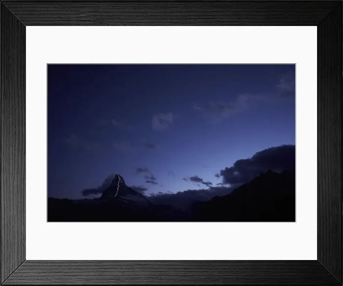Framed Print : Solar powered lights are pictured along the Hoernli ridge on the Matterhorn in Zermatt Framed Print : Solar powered lights are pictured along the Hoernli ridge on the Matterhorn in Zermatt
