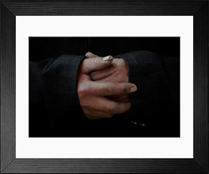 Framed Print : A believer prays at the government-sanctioned Catholic church during a mass on Palm