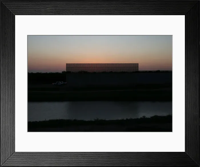 Framed Print : A section of border fence by the Mexico-U. S. border is pictured near McAllen Framed Print : A section of border fence by the Mexico-U. S. border is pictured near McAllen