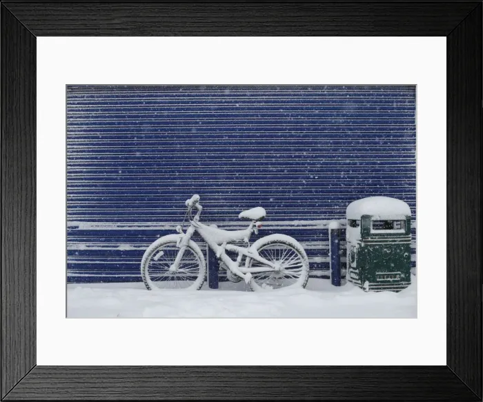 Framed Print : A bicycle is covered with snow near Grangemouth, Scotland