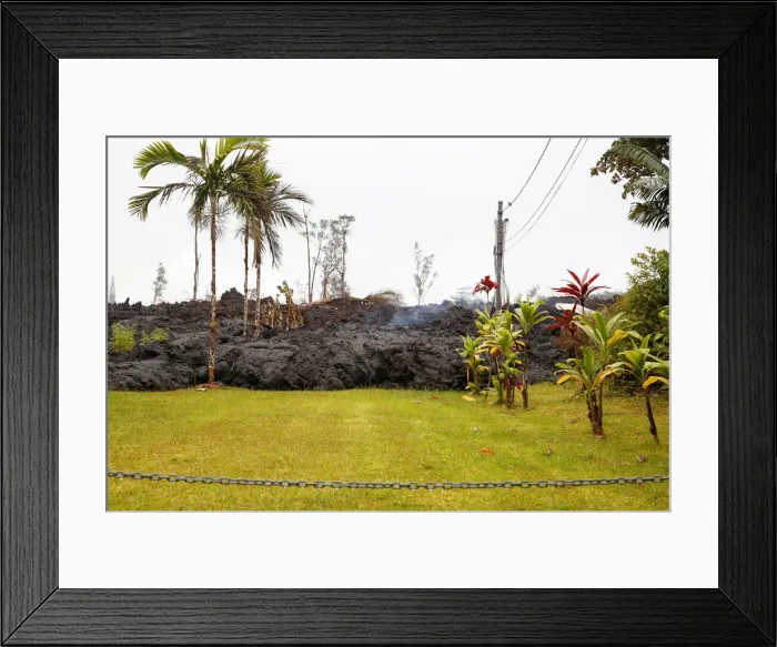 Framed Print : Lava partially covers a yard in the Leilani Estates subdivision during ongoing eruptions Framed Print : Lava partially covers a yard in the Leilani Estates subdivision during ongoing eruptions