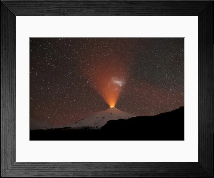 Framed Print : The Villarrica Volcano is seen at night from Pucon town Framed Print : The Villarrica Volcano is seen at night from Pucon town