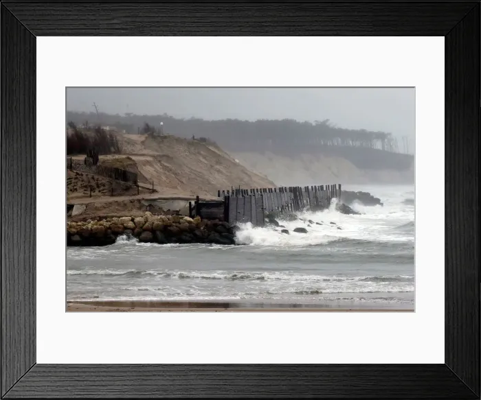 Framed Print : A view shows sea walls on the beach front to protect damaged sand dunes due to Framed Print : A view shows sea walls on the beach front to protect damaged sand dunes due to