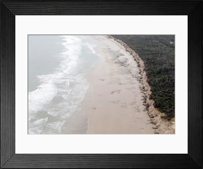 Framed Print : An aerial view shows damaged sand dune from erosion of the Atlantic Ocean coastline in Framed Print : An aerial view shows damaged sand dune from erosion of the Atlantic Ocean coastline in