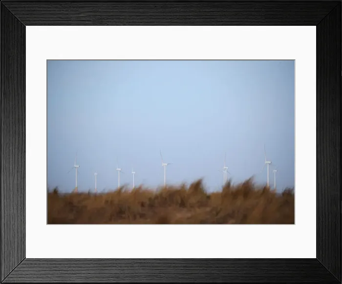 Framed Print : An offshore wind farm is seen from Great Yarmouth