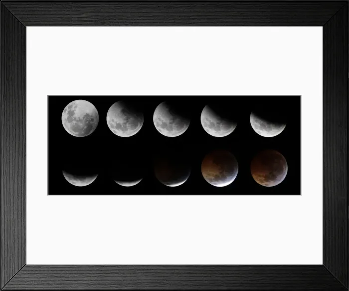 Framed Print : A combination of photographs shows the gradual lunar eclipse ending with a total eclipse Framed Print : A combination of photographs shows the gradual lunar eclipse ending with a total eclipse