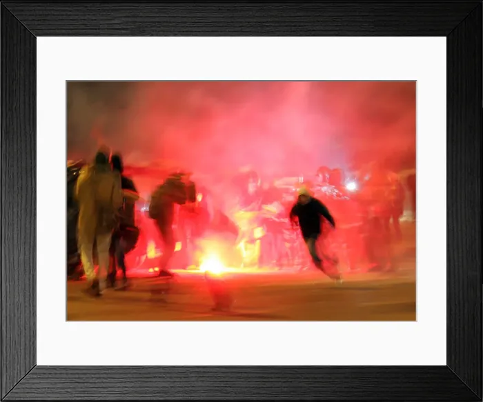 Framed Print : A protester runs away from the police after lighting a flare in Moscow Framed Print : A protester runs away from the police after lighting a flare in Moscow