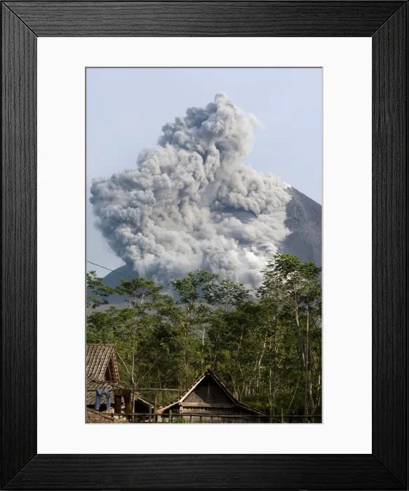 Framed Print : Mount Merapi spews pyroclastic smoke as seen from Balerante village in Klaten Framed Print : Mount Merapi spews pyroclastic smoke as seen from Balerante village in Klaten
