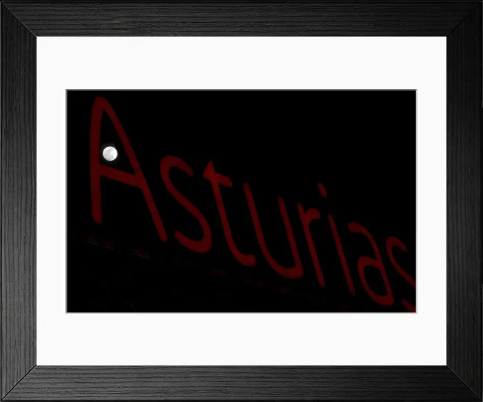 Framed Print : A full moon super moon is seen through a luminous sign with the name of the region