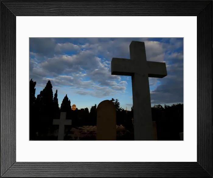 Framed Print : The Saint Patricks Barracks clock tower is seen from the Pembroke Military Cemetery in Framed Print : The Saint Patricks Barracks clock tower is seen from the Pembroke Military Cemetery in