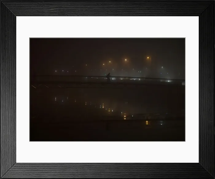 Framed Print : A person crosses a bridge during heavy fog in Dublin Framed Print : A person crosses a bridge during heavy fog in Dublin