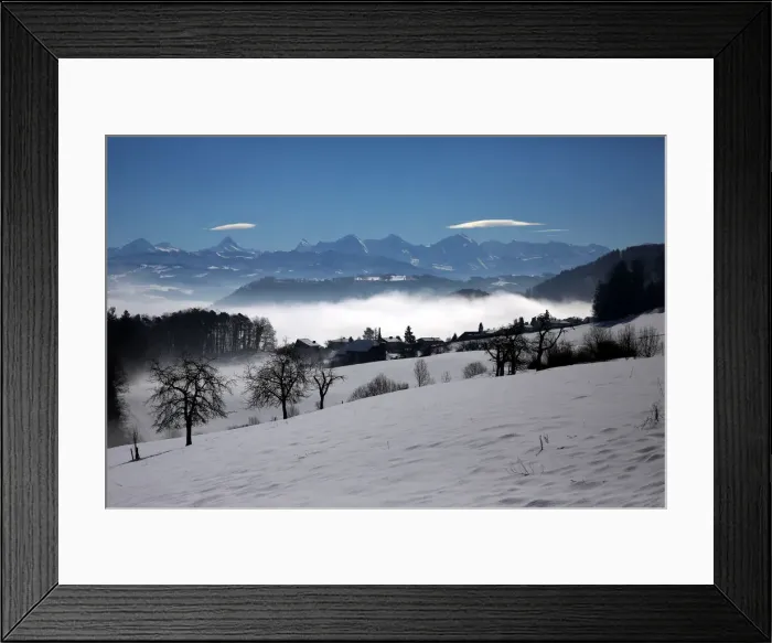 Framed Print : The Alps are seen behind fog near Bern