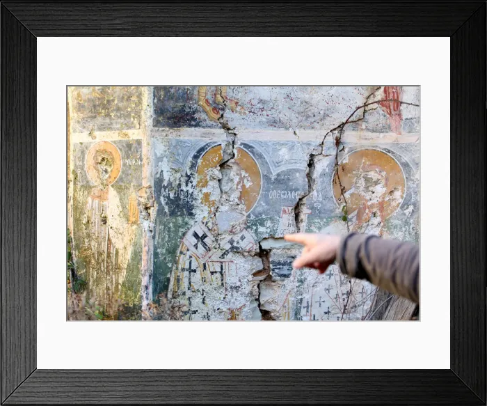 Framed Print : A damaged fresco is pictured in The Orthodox Church of Saint Athanasios in Muzina