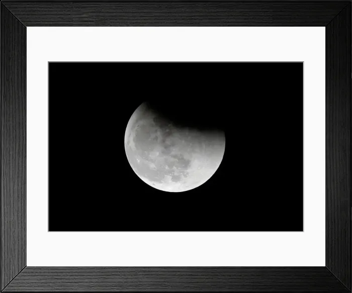Framed Print : The super blue moon is seen during a total lunar eclipse in Beijing Framed Print : The super blue moon is seen during a total lunar eclipse in Beijing