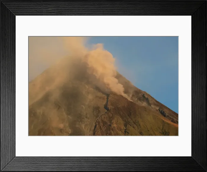 Framed Print : Mayon Volcano emits lava and ash during a mild eruption hours after a total lunar eclipse Framed Print : Mayon Volcano emits lava and ash during a mild eruption hours after a total lunar eclipse
