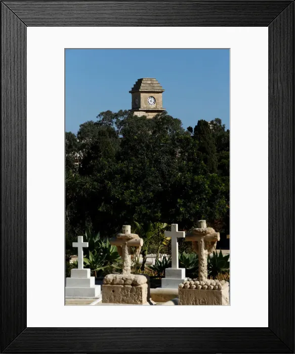 Framed Print : The Saint Patricks Barracks clock tower is seen from the Pembroke Military Cemetery in