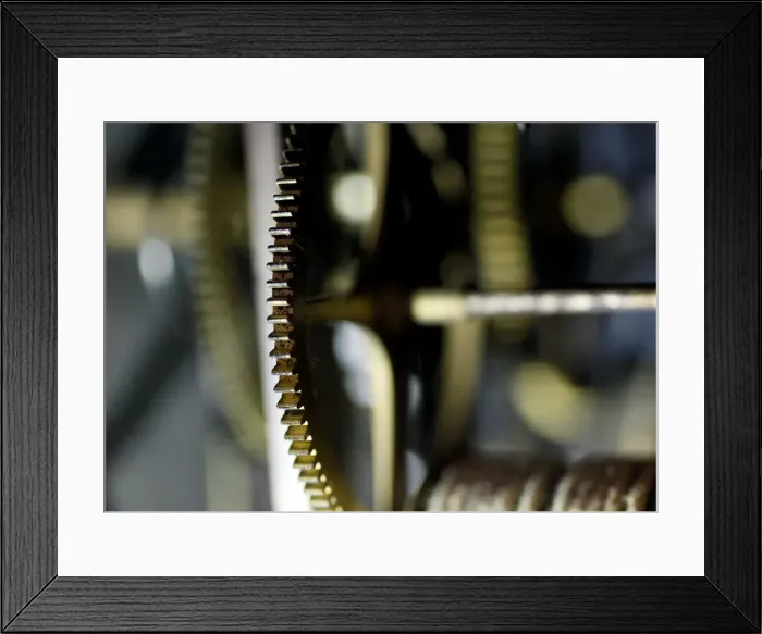 Framed Print : Gear wheels of a wall clock are pictured in a watchmakers shop in Bordeaux Framed Print : Gear wheels of a wall clock are pictured in a watchmakers shop in Bordeaux