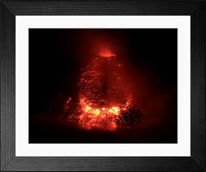 Framed Print : Lava flows from the crater of Mount Mayon Volcano during an eruption in Legazpi city Framed Print : Lava flows from the crater of Mount Mayon Volcano during an eruption in Legazpi city