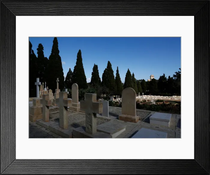Framed Print : The Saint Patricks Barracks clock tower is seen from the Pembroke Military Cemetery in