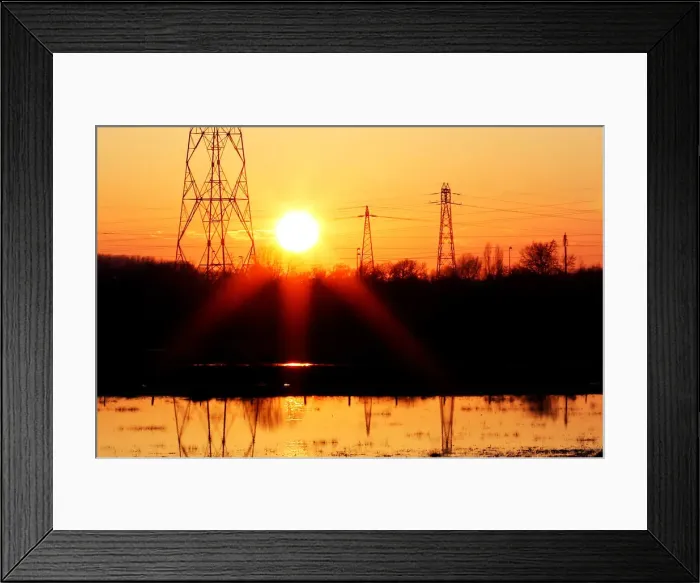 Framed Print : Pylons of high-tension electricity power lines are seen during sunset in Bordeaux Framed Print : Pylons of high-tension electricity power lines are seen during sunset in Bordeaux