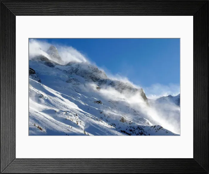 Framed Print : The snow sails to the top of a snowy mountain in Saint-Pancrace as winter weather Framed Print : The snow sails to the top of a snowy mountain in Saint-Pancrace as winter weather