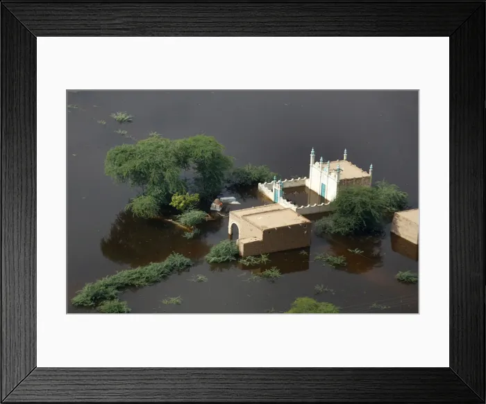 Framed Print : An aerial view of the flooded compound of a mosque in Pakistans Jafarabad district in Framed Print : An aerial view of the flooded compound of a mosque in Pakistans Jafarabad district in