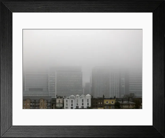 Framed Print : A low fog engulfs the skyscrapers of the financial district of Canary Wharf Framed Print : A low fog engulfs the skyscrapers of the financial district of Canary Wharf