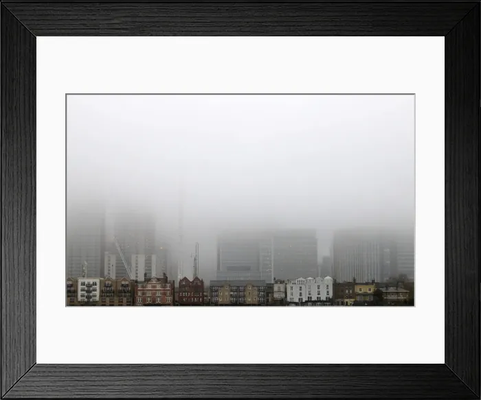 Framed Print : A low fog engulfs the skyscrapers of the financial district of Canary Wharf Framed Print : A low fog engulfs the skyscrapers of the financial district of Canary Wharf