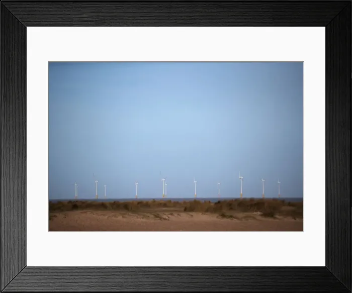 Framed Print : An offshore wind farm is seen from Great Yarmouth