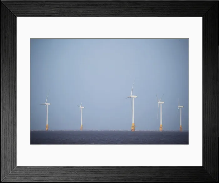 Framed Print : An offshore wind farm is seen from Great Yarmouth