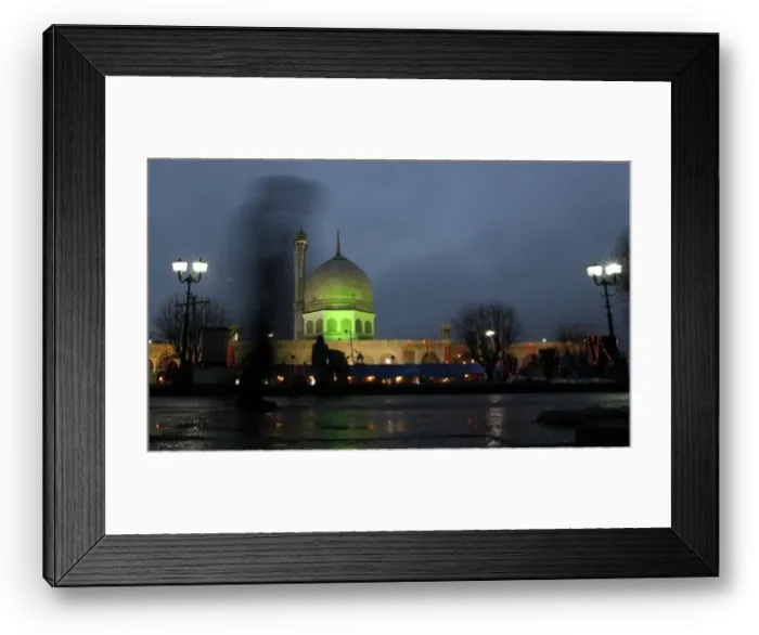 Framed Print : A man walks in front of Kashmirs holiest shrine Hazratbal