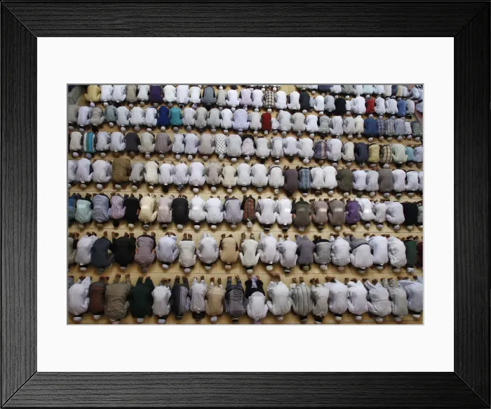Framed Print : Muslim offer first Friday prayers during the Muslim holy month of Ramadan at a mosque in Framed Print : Muslim offer first Friday prayers during the Muslim holy month of Ramadan at a mosque in