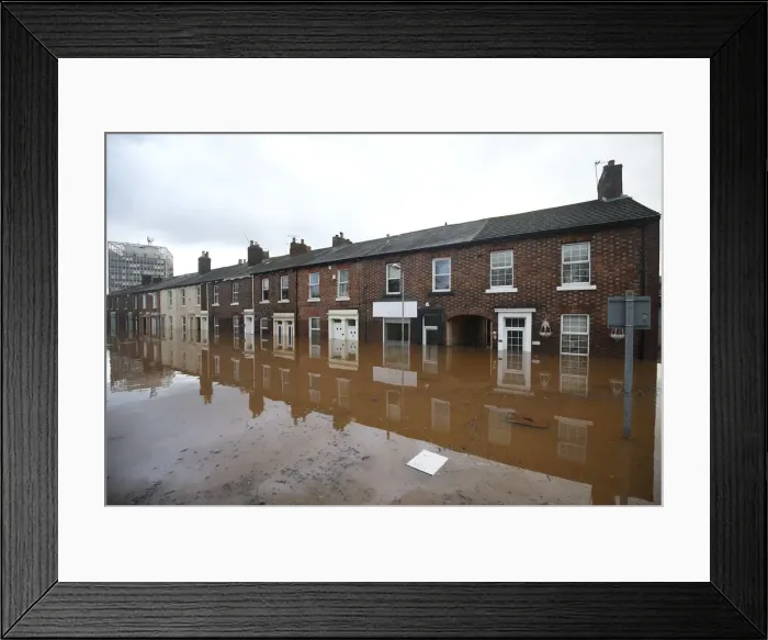 Framed Print : The city centre in seen under flood waters in Carlisle, north west England Framed Print : The city centre in seen under flood waters in Carlisle, north west England