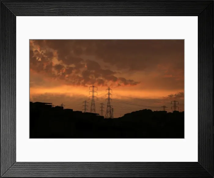 Framed Print : Pylons of high-tension electricity power lines are seen near houses at Villa Maria del Framed Print : Pylons of high-tension electricity power lines are seen near houses at Villa Maria del