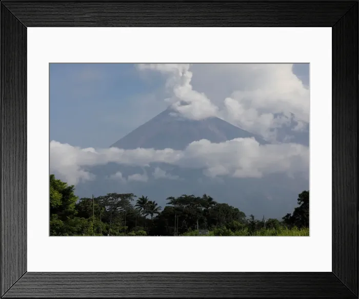 Framed Print : The Fuego volcano spews out a plume of ash and smoke as seen from El Rodeo in Escuintla Framed Print : The Fuego volcano spews out a plume of ash and smoke as seen from El Rodeo in Escuintla