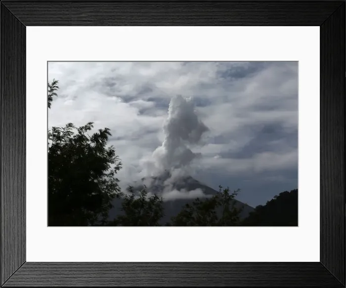 Framed Print : A general view shows the Fuego volcano from Yepocapa in Chimaltenango