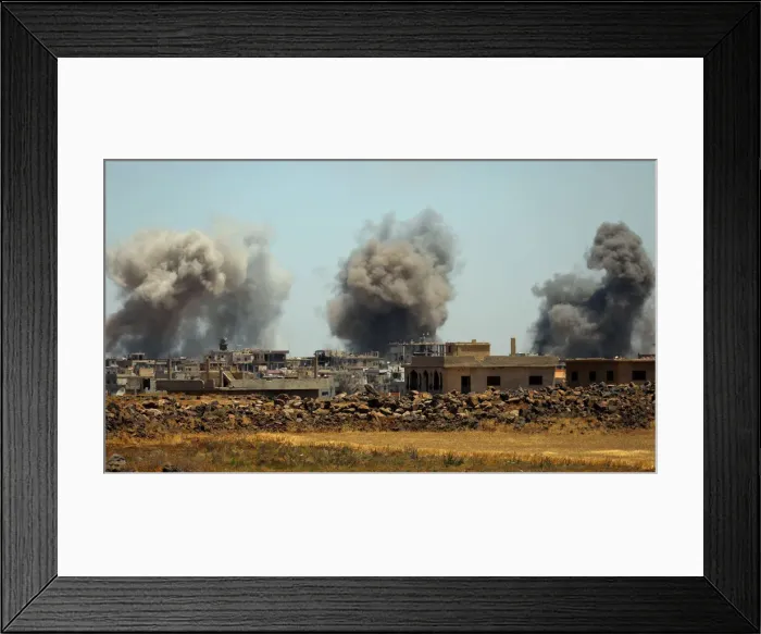 Framed Print : Smoke rises from al-Harak town, as seen from Deraa countryside Framed Print : Smoke rises from al-Harak town, as seen from Deraa countryside