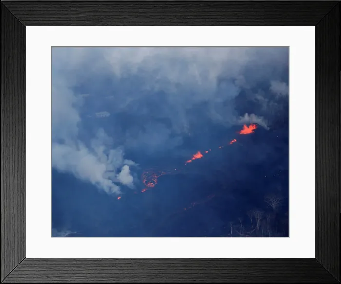 Framed Print : Lava shoots out of a fissure in the Leilani Estates near Pahoa, Hawaii Framed Print : Lava shoots out of a fissure in the Leilani Estates near Pahoa, Hawaii