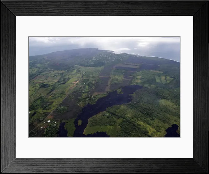 Framed Print : Lava cuts through the Malama Ki area towards the ocean near Pahoa, Hawaii Framed Print : Lava cuts through the Malama Ki area towards the ocean near Pahoa, Hawaii