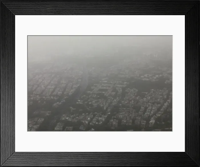 Framed Print : Buildings are seen blanketed by haze and dust in New Delhi Framed Print : Buildings are seen blanketed by haze and dust in New Delhi