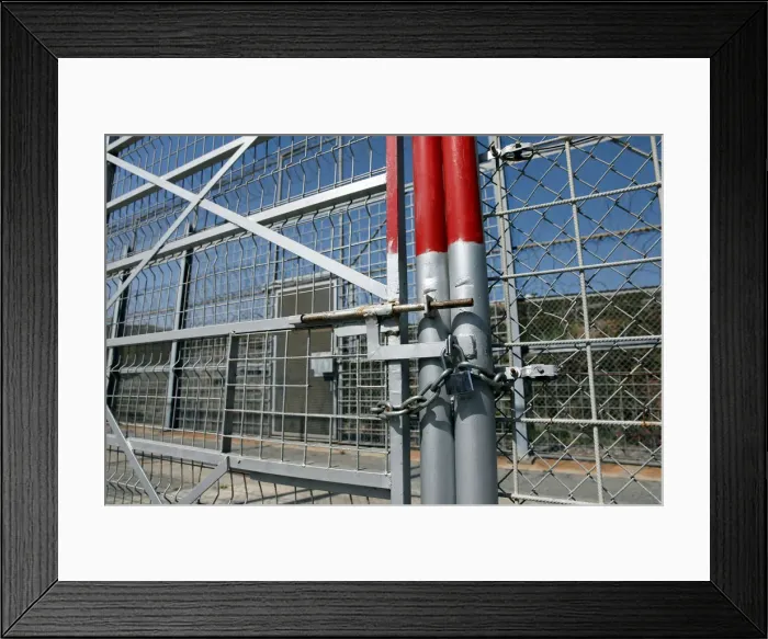 Framed Print : The border fence separating Spains northern enclave Ceuta and Morocco is seen from Ceuta Framed Print : The border fence separating Spains northern enclave Ceuta and Morocco is seen from Ceuta