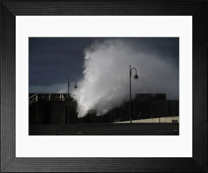 Framed Print : Waves crash against a seafront a the port town of Puerto de Vega Framed Print : Waves crash against a seafront a the port town of Puerto de Vega