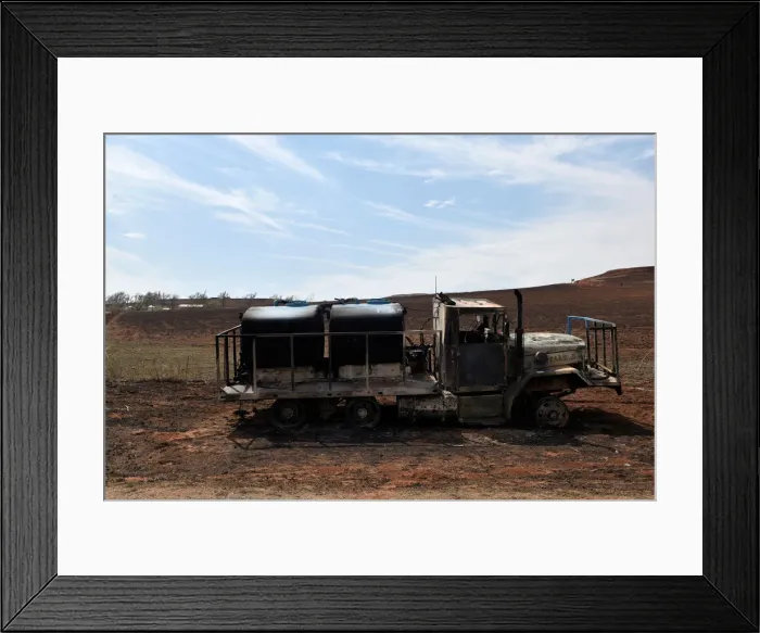 Framed Print : A firetruck that was destroyed by the Rhea fire is seen near Taloga Framed Print : A firetruck that was destroyed by the Rhea fire is seen near Taloga
