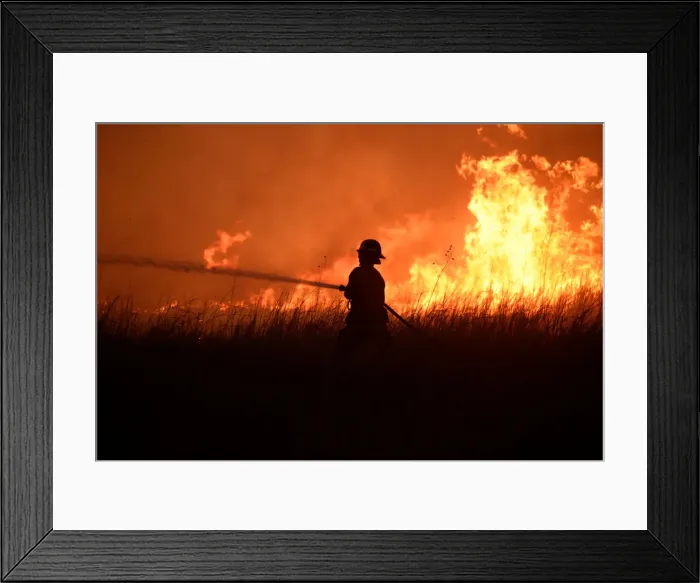 Framed Print : A firefighter works to control the Rhea fire near Seiling Framed Print : A firefighter works to control the Rhea fire near Seiling