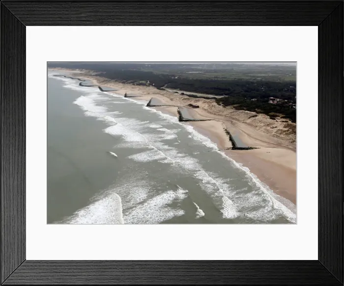 Framed Print : An aerial view shows sea walls on the beach that protect sand dunes from erosion along Framed Print : An aerial view shows sea walls on the beach that protect sand dunes from erosion along