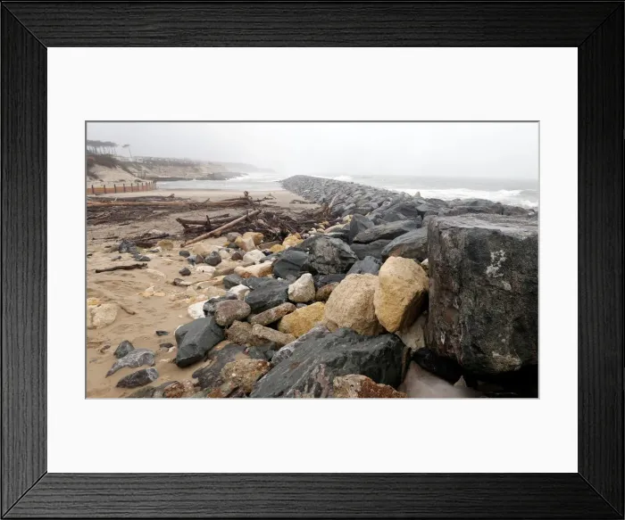 Framed Print : Sea wall on the beach that protect sand dunes from erosion along the Atlantic Ocean coast Framed Print : Sea wall on the beach that protect sand dunes from erosion along the Atlantic Ocean coast