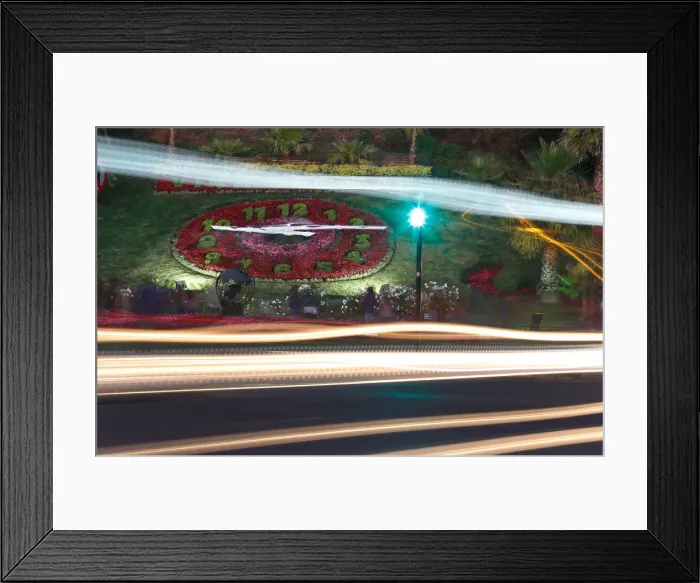Framed Print : Tourists stand in front of a giant clock made of flowers in Vina del Mar
