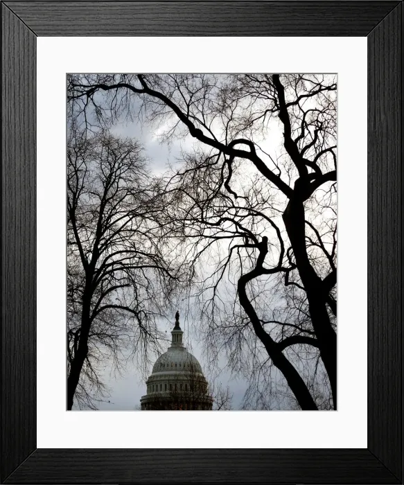 Framed Print : Clouds pass over the U. S. Capitol at the start of the third day of a shutdown of