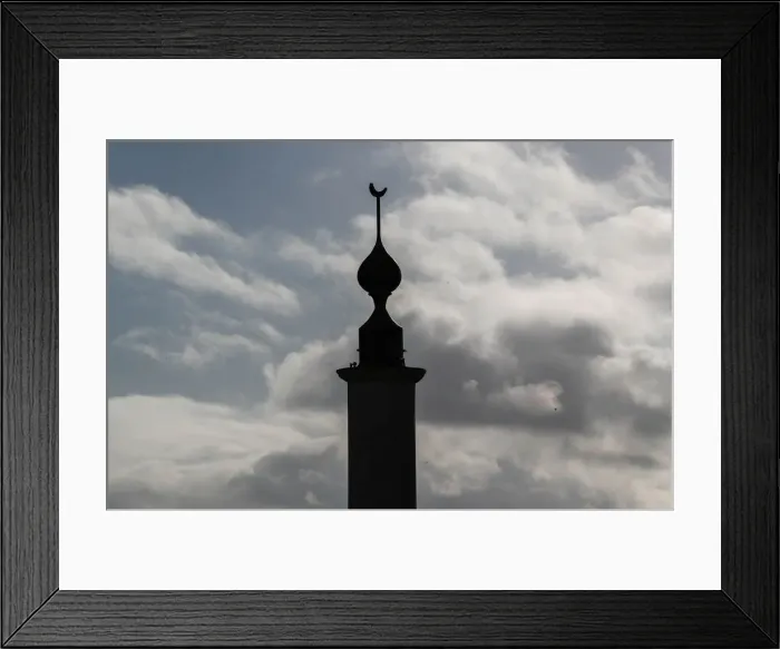 Framed Print : The minaret of Brussels Great Mosque is seen in Brussels Framed Print : The minaret of Brussels Great Mosque is seen in Brussels