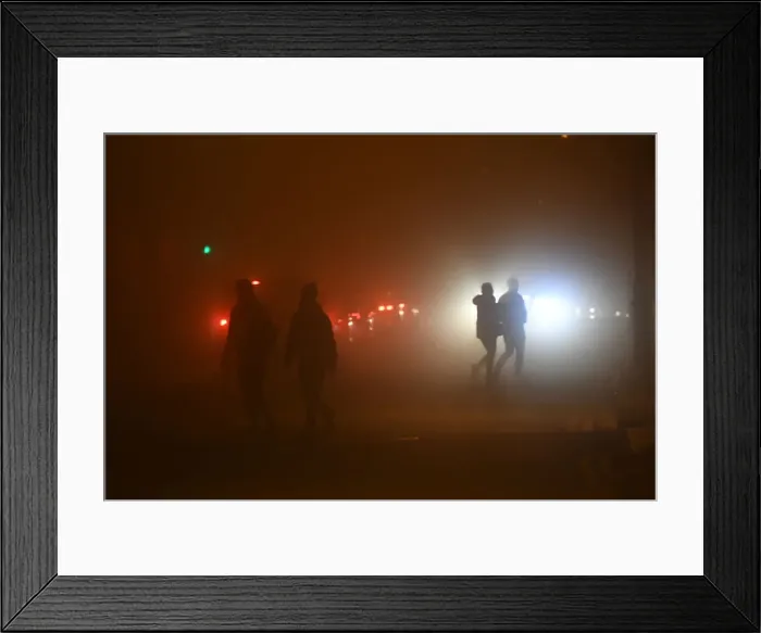 Framed Print : People walk across a road during heavy fog in Dublin Framed Print : People walk across a road during heavy fog in Dublin
